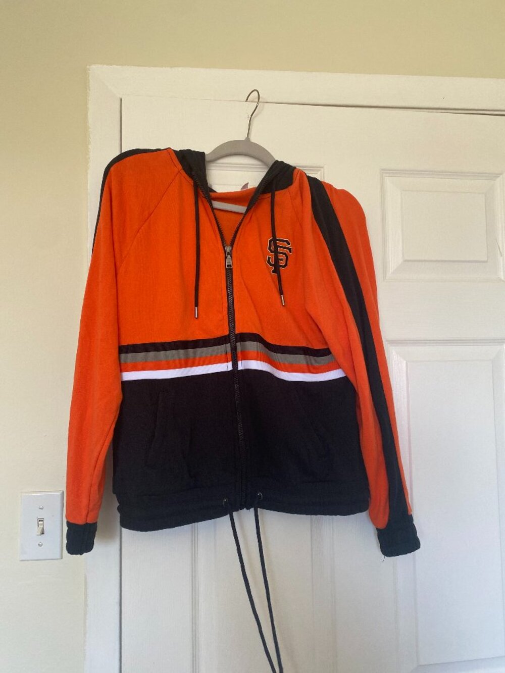 "Wear" brand black and orange SF Giants hooded zip up sweatshirt Size S/P